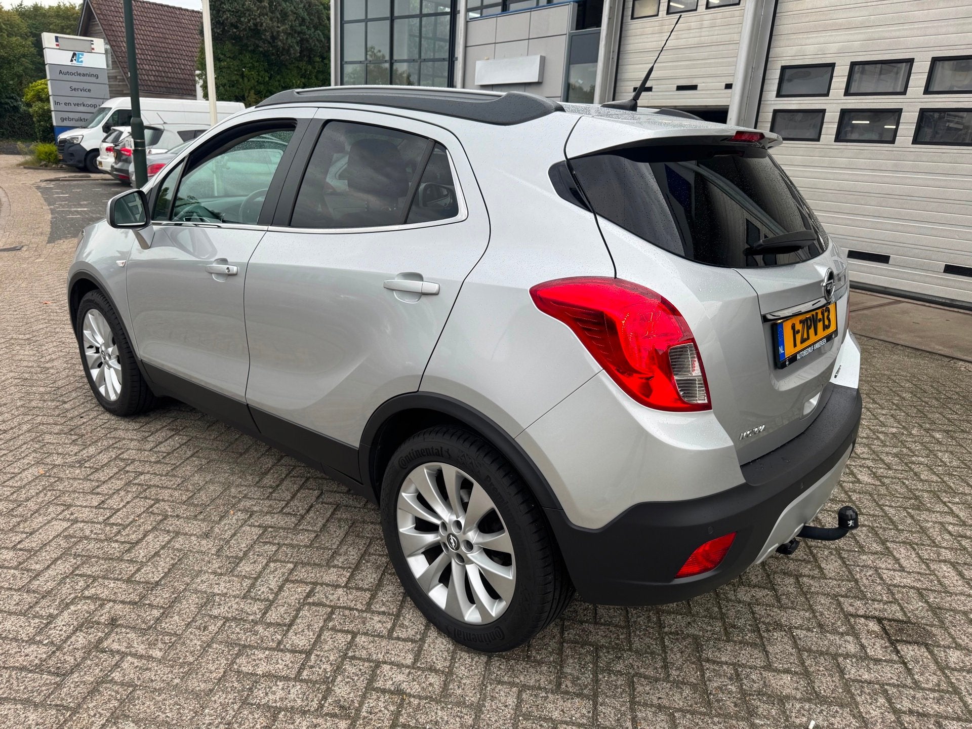 Opel Mokka 1.4 T Cosmo Airco,Camera,Trekhaak, Auto's, Euro 5, Gebruikt, 4 cilinders, Origineel Nederlands
