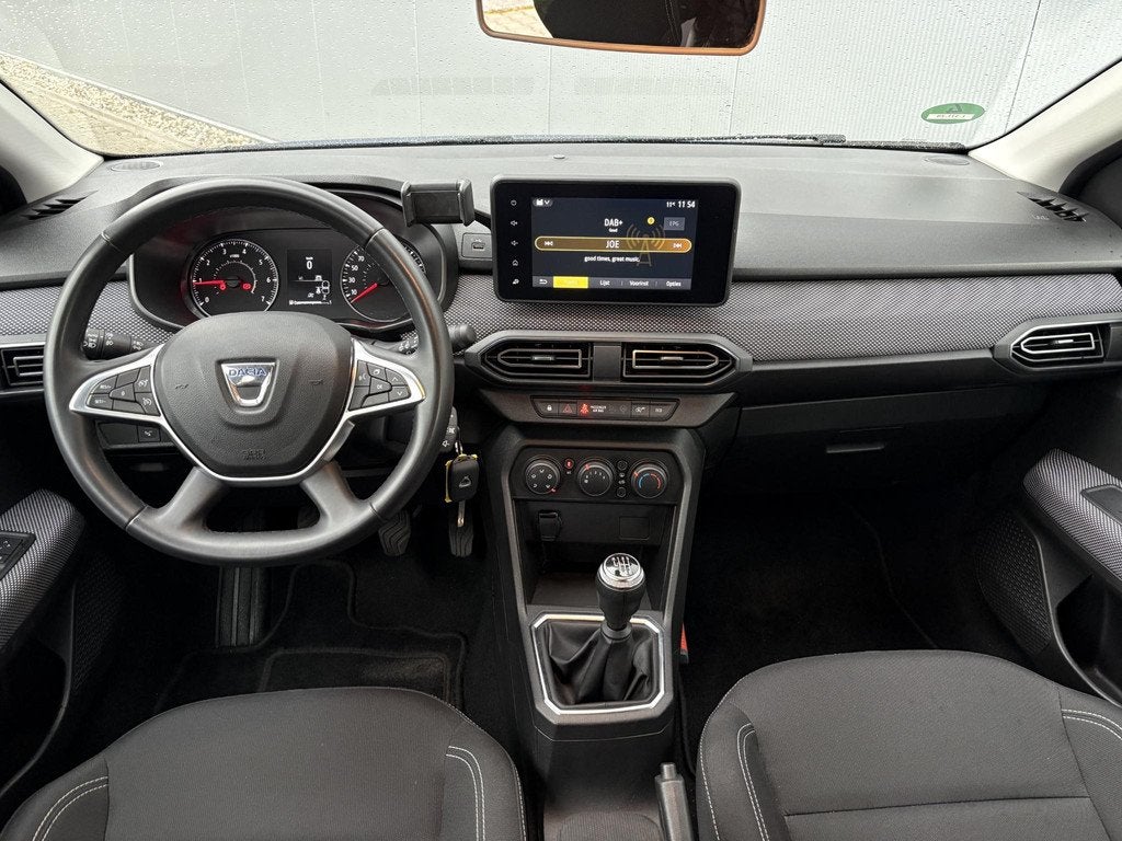 Dacia Sandero 1.0 TCe 90 Comfort / Trekhaak / Navigatie via, Auto's, Dacia, Stof, Euro 6, Blauw, Origineel Nederlands
