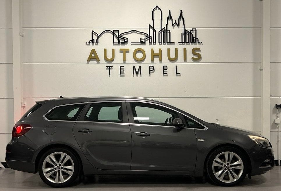Opel Astra Sports Tourer 1.4 Turbo Sport Nap Airco Cruise Pa, Auto's, Opel, Voorwielaandrijving, Euro 5, Stof, Gebruikt