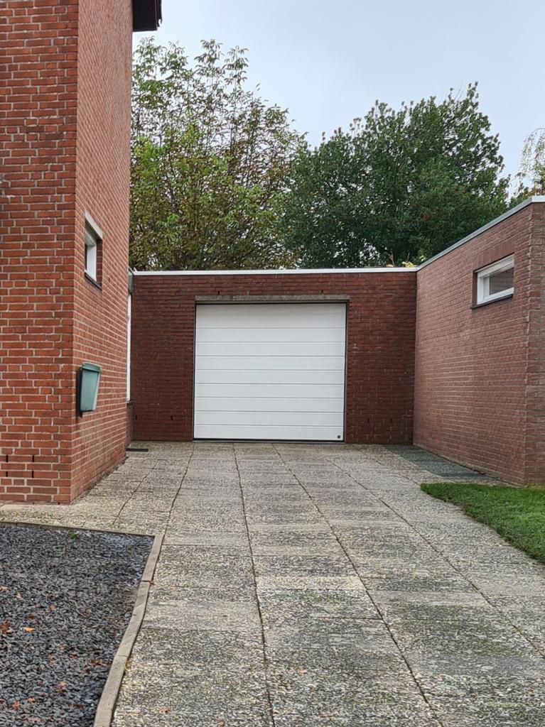 Sectionale garagepoort 240cm breed, Ophalen
