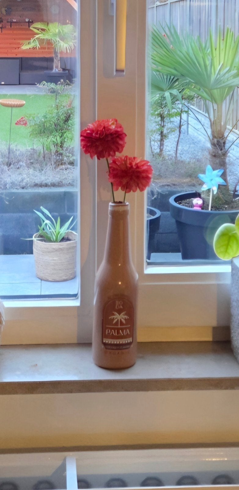 Flesje met bloemen deco palm als nieuw, Ophalen of Verzenden, Zo goed als nieuw, Overige kleuren, Glas