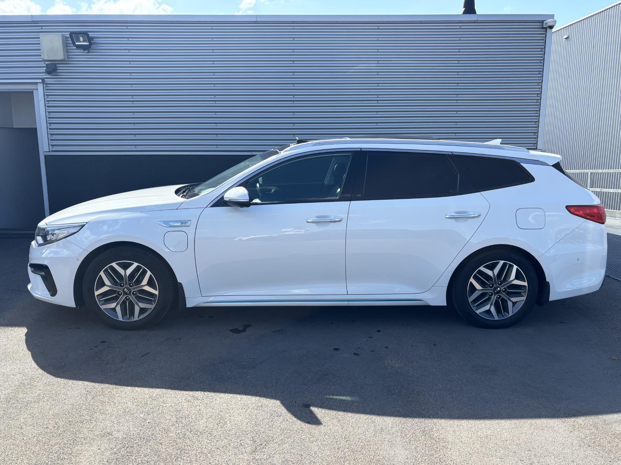 Kia Optima Sportswagon 2.0 GDI PHEV ExecutiveLine Schuif/kan, Auto's, Kia, Gebruikt, Euro 6, Lichtsensor, Wit