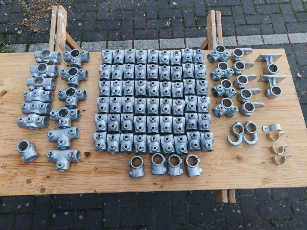 Steigerbuizen en koppelingen te koop, Ophalen, Zo goed als nieuw, IJzer