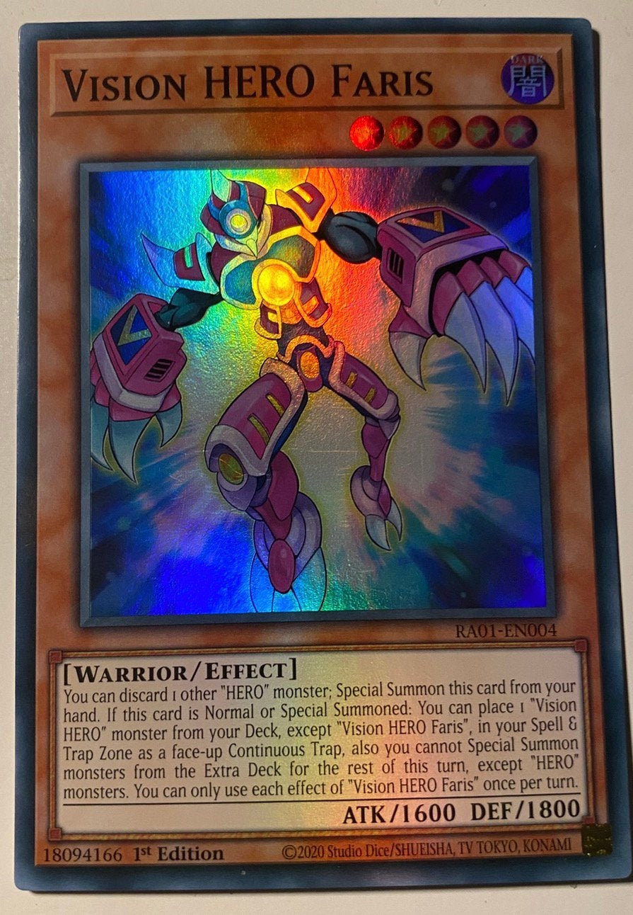 Yu-Gi-Oh! Vision HERO Faris RA01 1st Edition !, Ophalen of Verzenden, Gebruikt, Losse kaart, Foil
