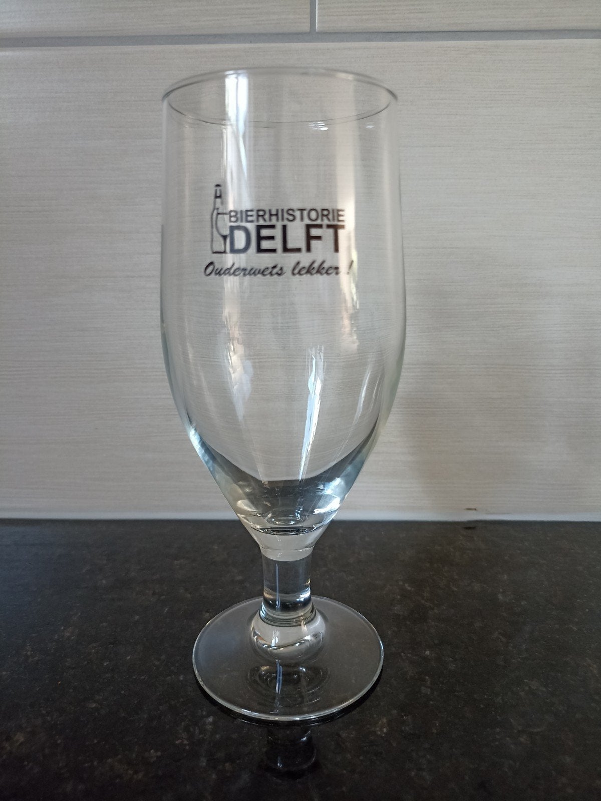 Bierglas Bierhistorie Delft Ouderwets Lekker zeldzaam glas, Ophalen of Verzenden, Nieuw, Bierglas