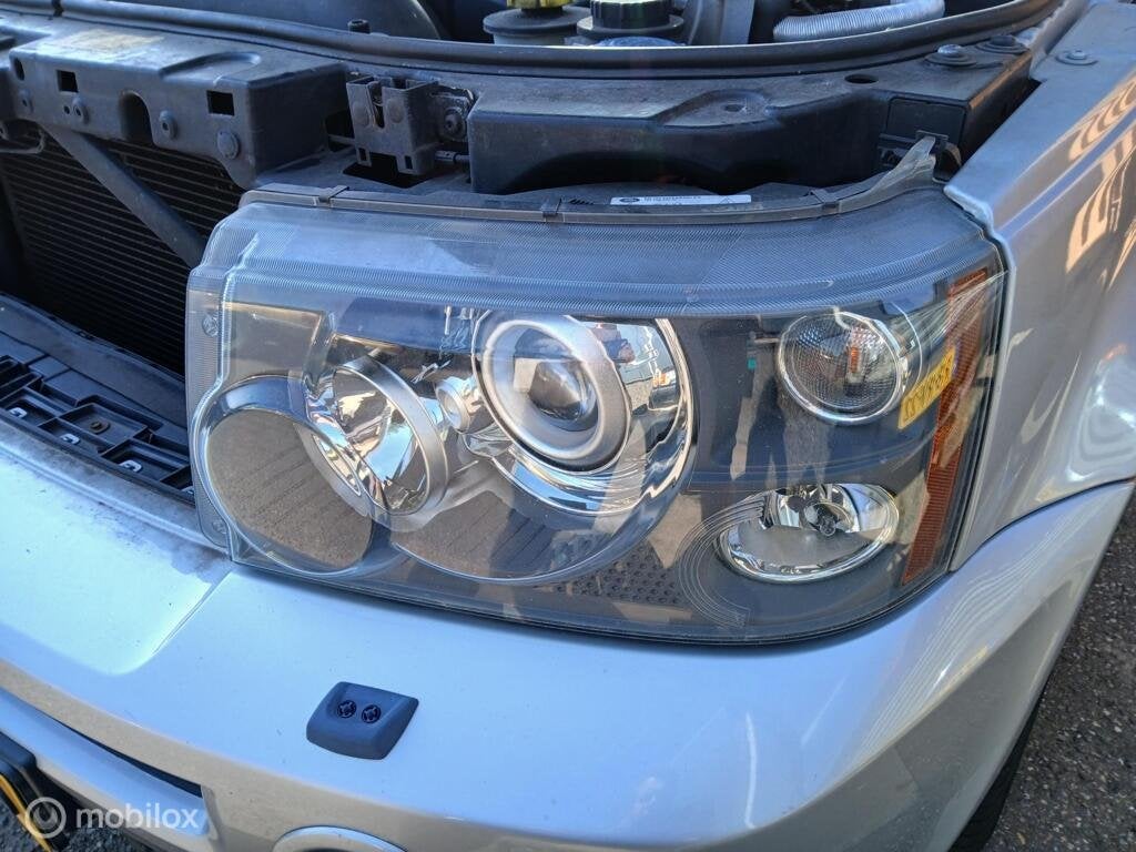 Koplamp Range Rover Sport L320 AFS bochtenverlichting, Land Rover, Ophalen of Verzenden