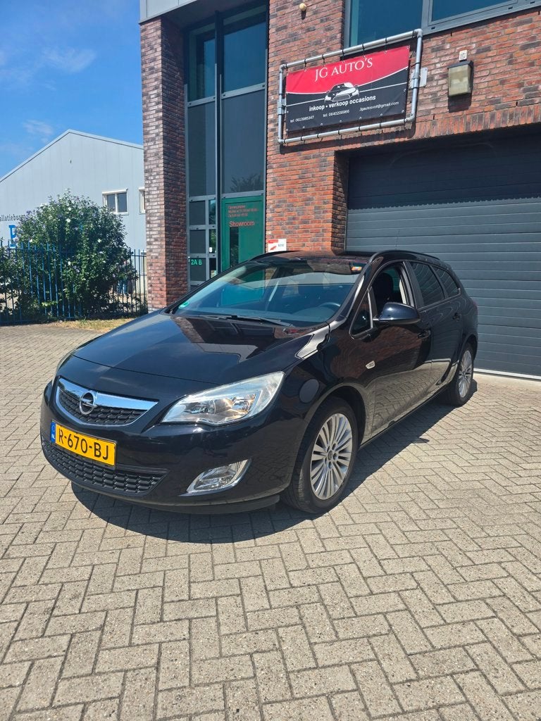 Opel Astra Sports Tourer 1.4 Turbo Edition, Auto's, Voorwielaandrijving, Euro 5, Gebruikt, 4 cilinders
