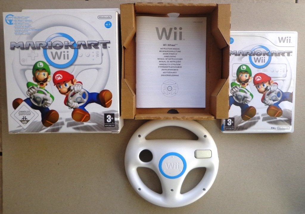 Mario Kart + origineel stuurtje voor Wii Compleet in doos, Spelcomputers en Games, Games | Nintendo Wii, Racen en Vliegen, Ophalen of Verzenden