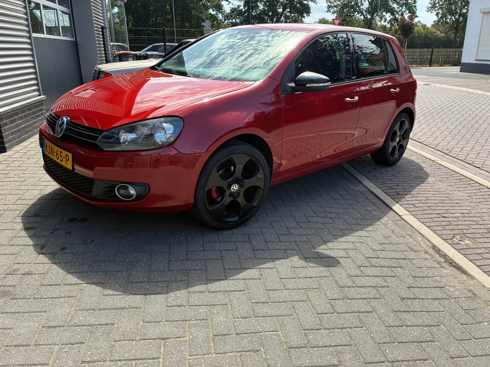 Volkswagen  2011 Roodmetalic allstar, Auto's, Stof, 4 cilinders, Handgeschakeld, 600 kg