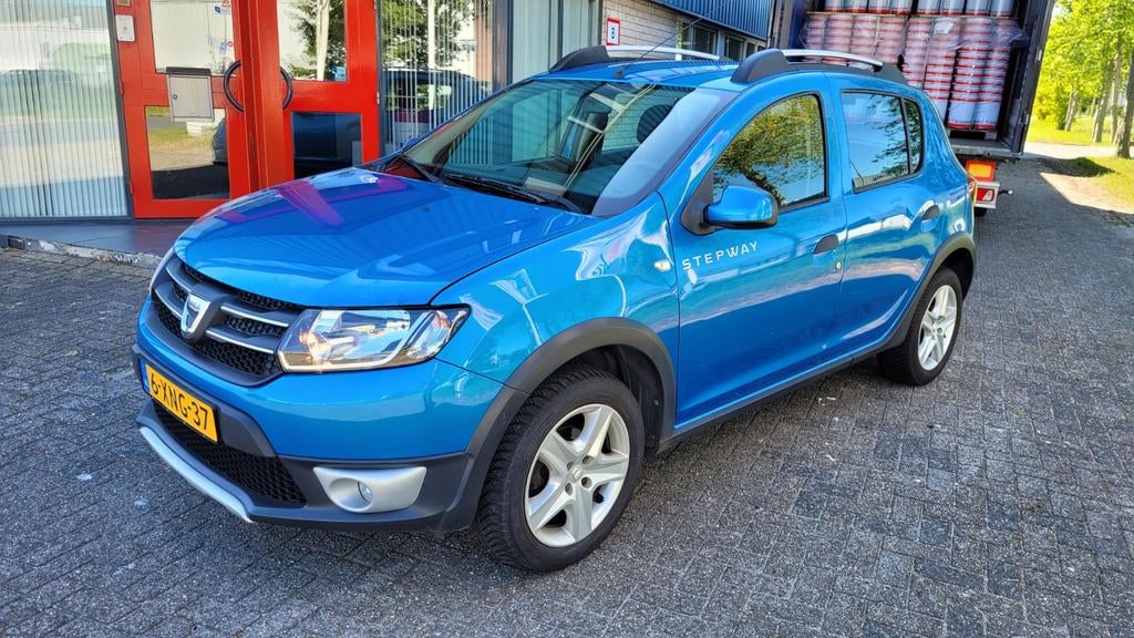 Dacia Sandero 0.9 TCE 66KW Stepway 2014  nw apk/navi/pdc/nap, Auto's, Voorwielaandrijving, 898 cc, Stof, 40 €/maand