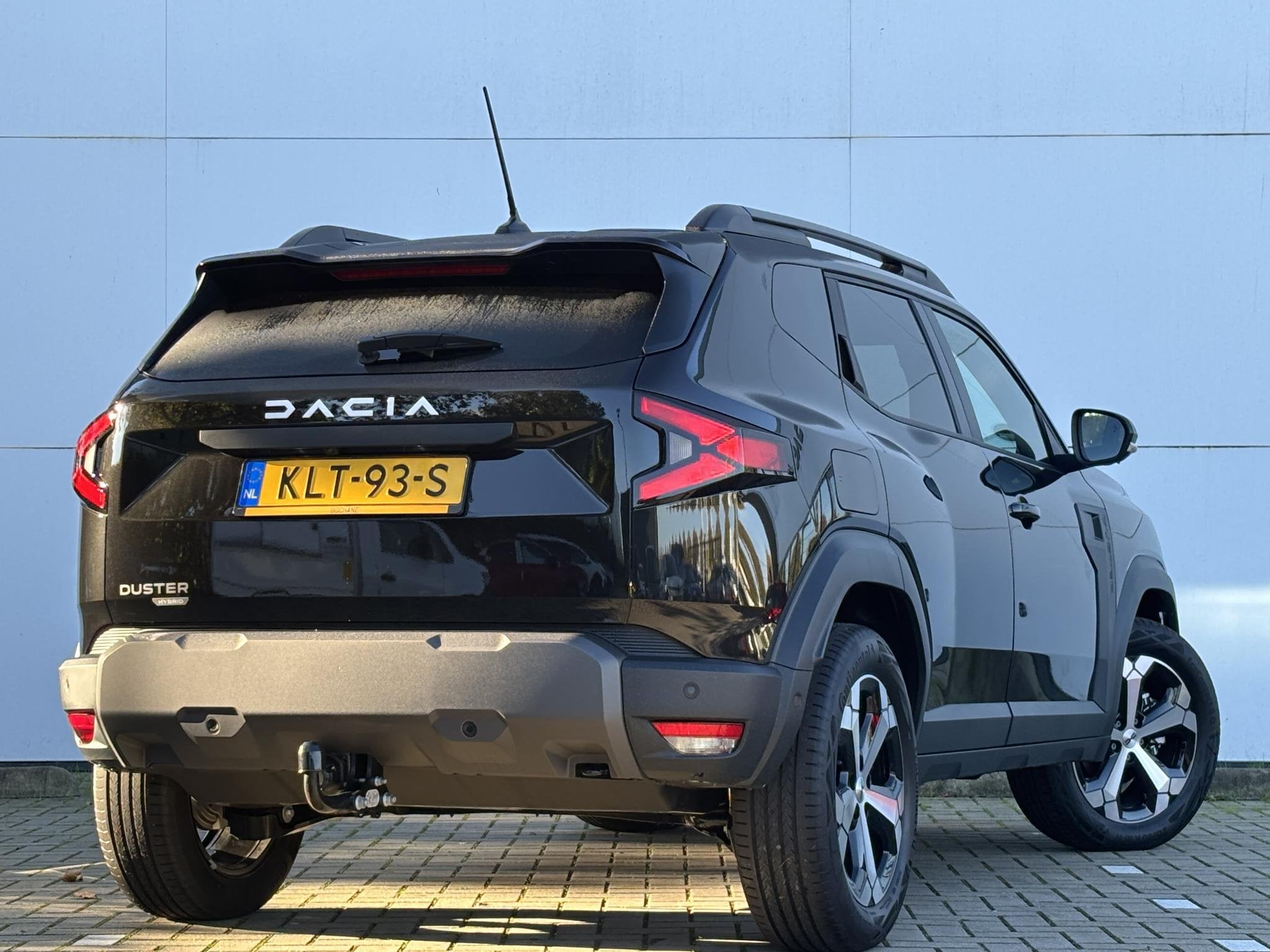 Dacia Duster 1.8 hybrid 155 limited edition l Trekhaak l, Auto's, Stof, Euro 6, Zwart, Origineel Nederlands