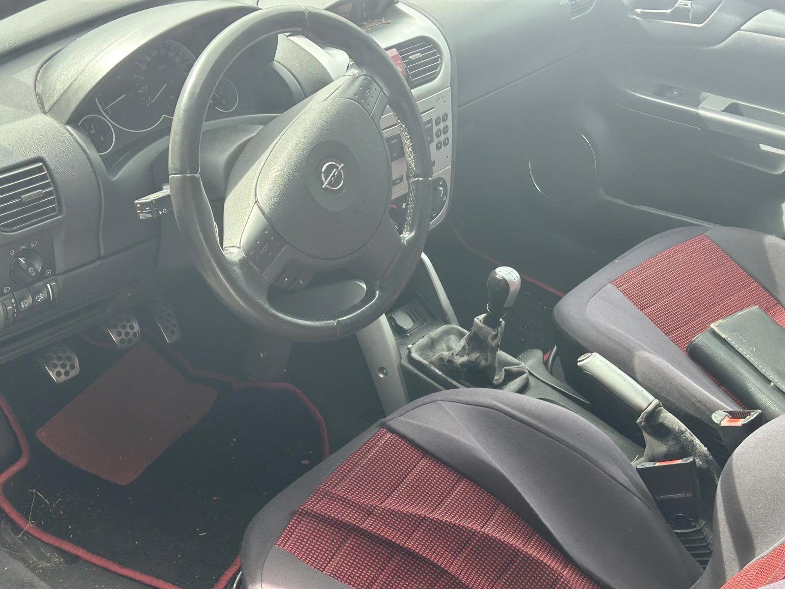 Opel Tigra TwinTop 1.4-16V Cosmo, Voorwielaandrijving, Gebruikt, Zwart, 4 cilinders