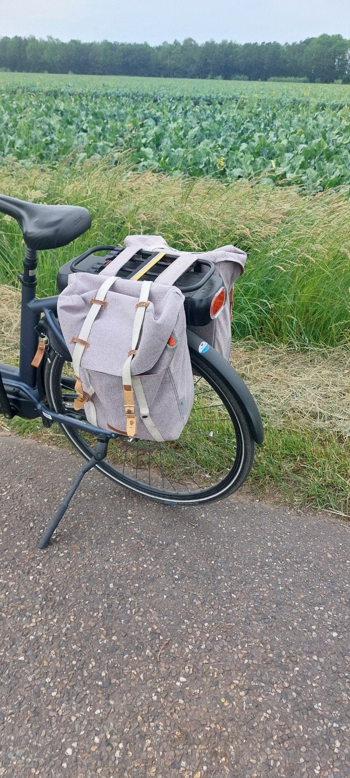 Dubbele fietstas, Ophalen