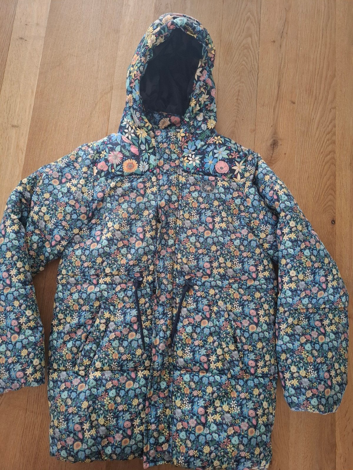 Winterjas Tumble 'n Dry maat 134/140 met bloemenprint, Tumble 'n Dry, Gebruikt, Meisje, Ophalen of Verzenden