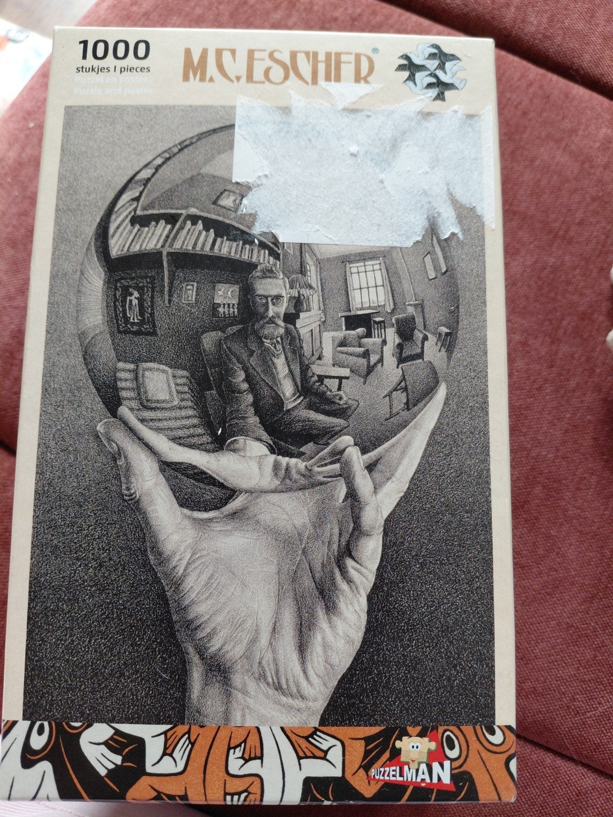 M.C. Escher 'Hand met bol' legpuzzel 1000 stukjes, Ophalen of Verzenden, 500 t/m 1500 stukjes, Zo goed als nieuw, Legpuzzel