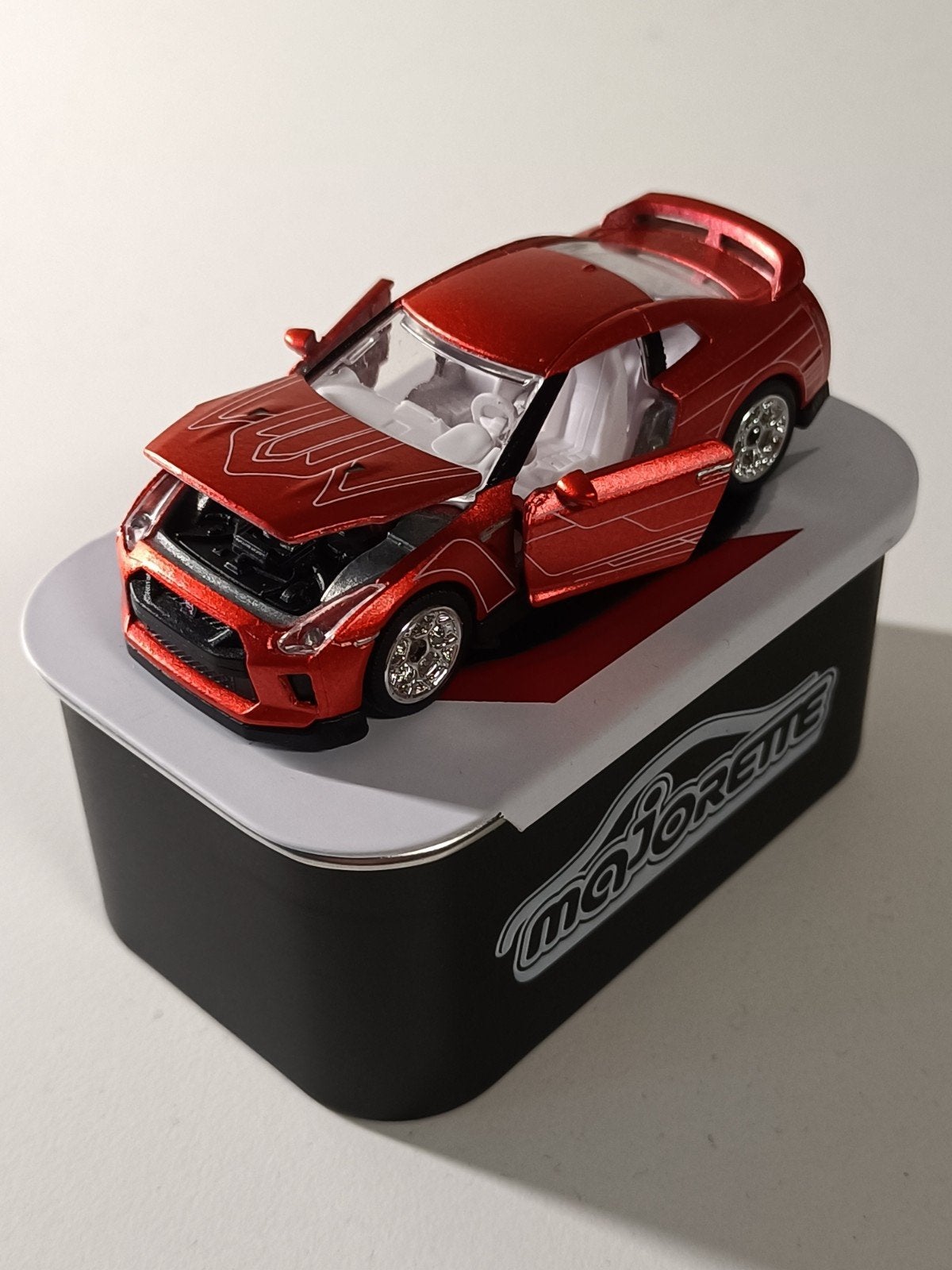 Majorette Nissan GT-R modelauto in blik, moving parts, Hobby en Vrije tijd, Ophalen of Verzenden, Zo goed als nieuw