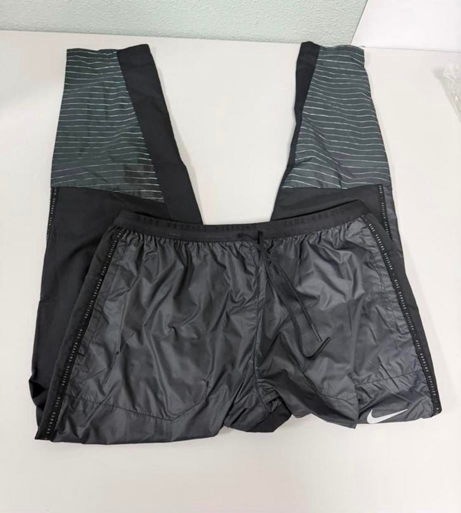Nike Storm-FIT Running Division broek maat L waterproof zgan, Heren, Regenbroek, Ophalen of Verzenden, Zo goed als nieuw