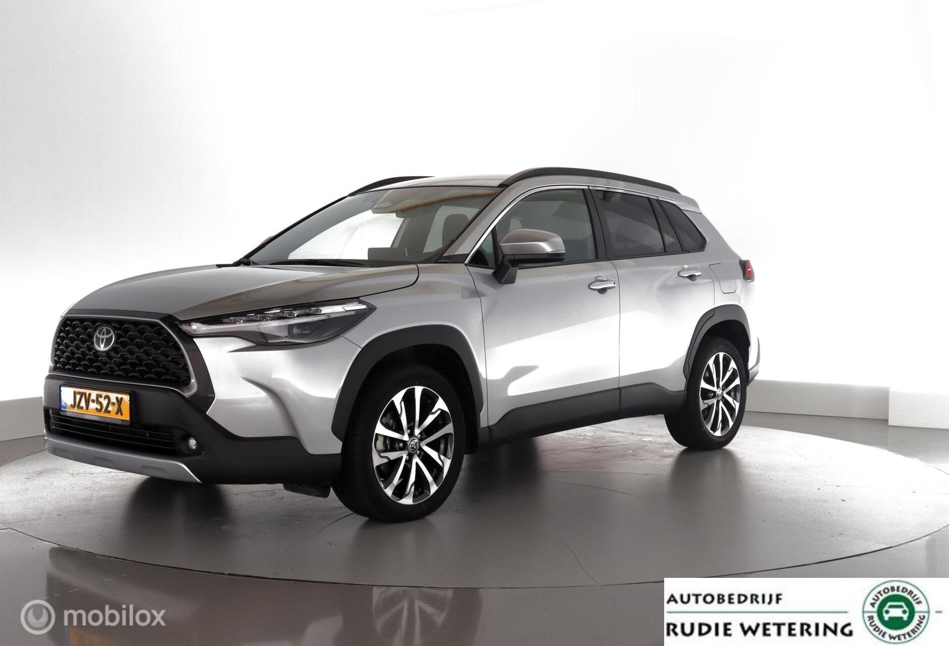 Toyota Corolla Cross Hybrid 140PK Dynamic led|nav|cam|dab|ac, Auto's, Stof, Gebruikt, 4 cilinders, Met garantie (alle)