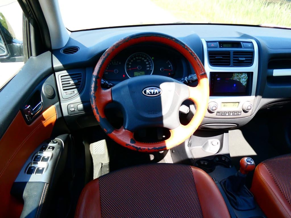 Kia Sportage 2.0 CVVT 142pk Clima Cruise Leder Schuifdak Tre, 1442 kg, Gebruikt, 4 cilinders, Zwart