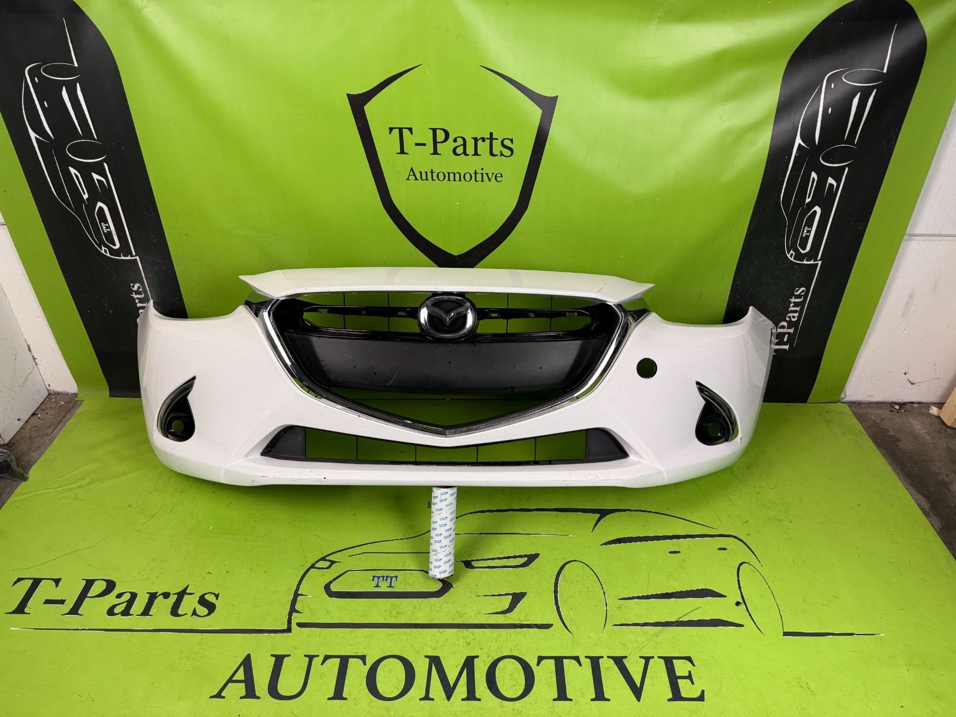 mazda 2 voorbumper bumper, Gebruikt, Shinchi, Fuchu-Cho 3-1
730-8670  Hiroshima, Mazda Motor Corporation, Info@mazda.co.jp