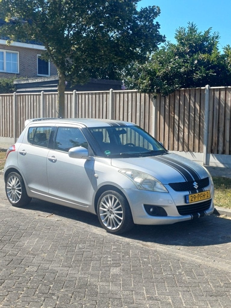 Suzuki Swift 1.2 2011 Grijs, Voorwielaandrijving, Stof, 4 cilinders, 400 kg