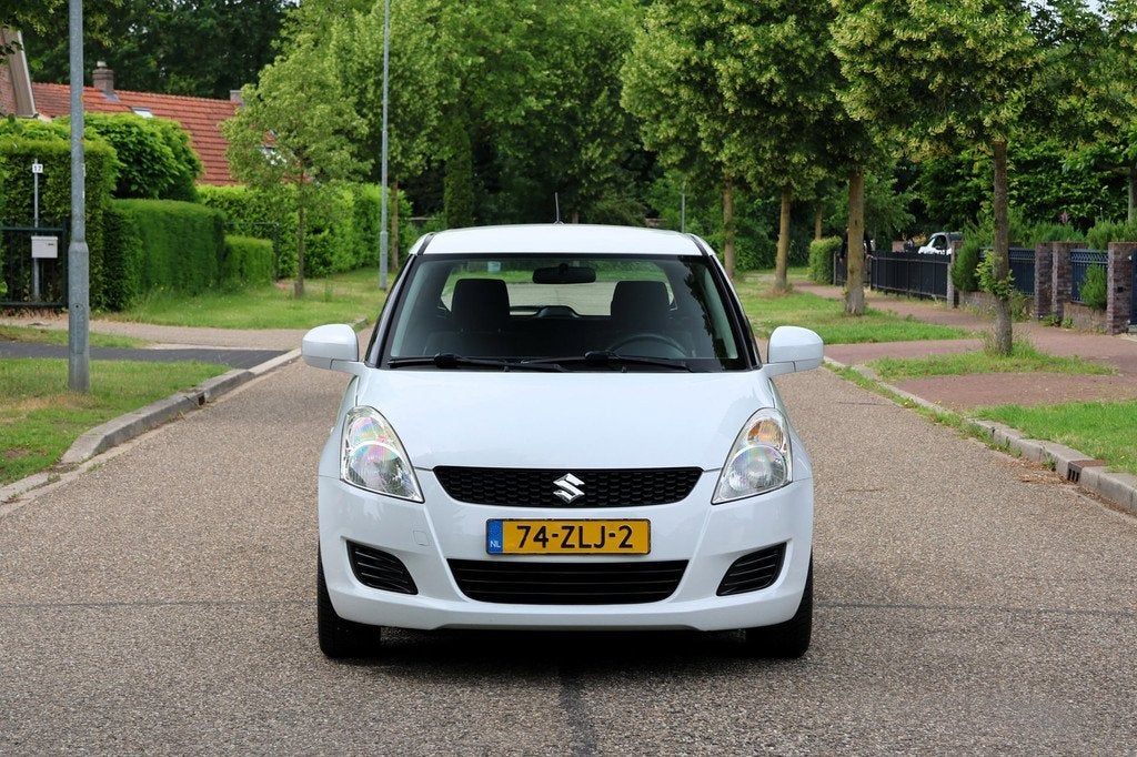 Suzuki Swift 1.2 Bandit EASSS | AIRCO | CRUISE | TREKHAAK |, Voorwielaandrijving, Gebruikt, Stoelverwarming, 400 kg