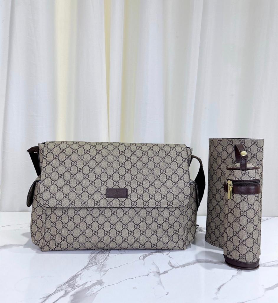 Gucci luiertas, inclusief verschoonmat en fleshouder, Ophalen of Verzenden, Nieuw
