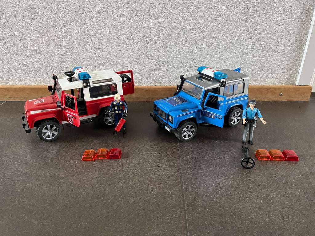 Bruder Land Rover brandweerauto en politieauto, Ophalen of Verzenden, Gebruikt, Jongen of Meisje