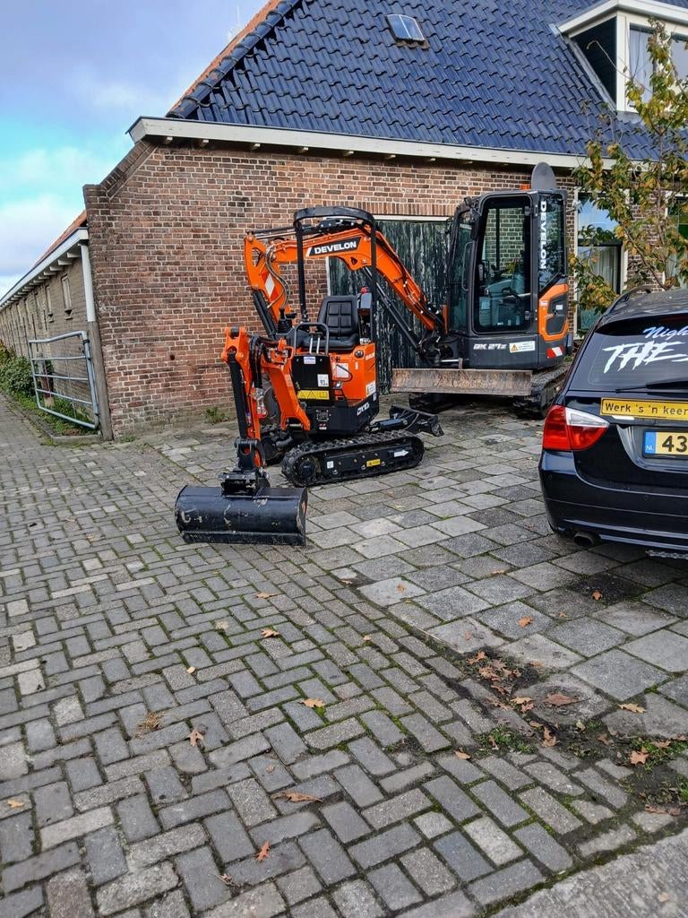 Te huur develon dx10z-7 minikraan, Ophalen of Verzenden, Graafmachine