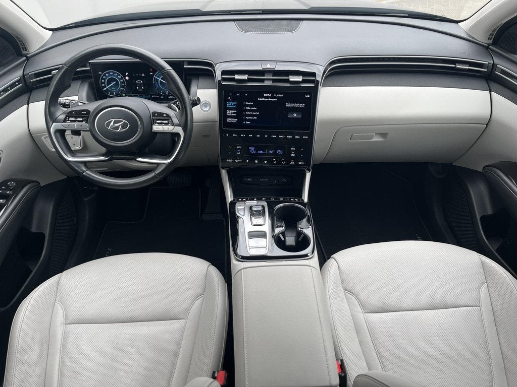 Hyundai Tucson 1.6 T-GDI PHEV Premium Sky 4WD / Panorama sch, Auto's, Hyundai, 1350 kg, 14 kWh, Gebruikt, Euro 6