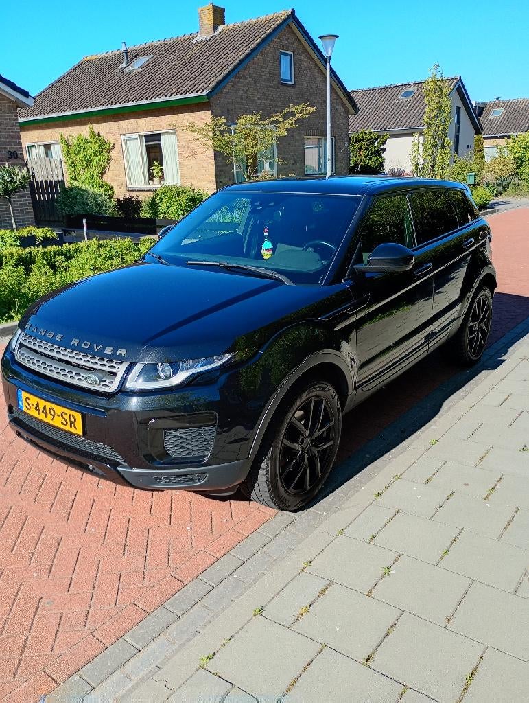 Land Rover Range Rover Evoque 2.0 SI4 4WD AUT 2016 Zwart, Auto's, 1800 kg, Zwart, 4 cilinders, Zwart