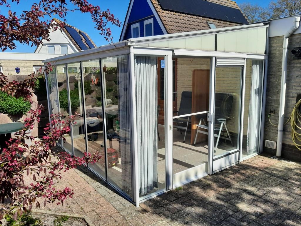 Te koop aanbouw serre, Ophalen