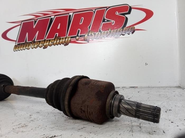 Aandrijfas links-voor van een Nissan Almera Tino, Auto-onderdelen, Gebruikt, -, -, Ophalen of Verzenden