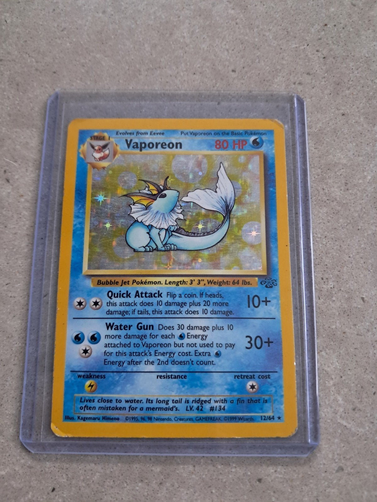 Vaporeon 12/64 Jungle (Holo), Ophalen of Verzenden, Gebruikt, Losse kaart