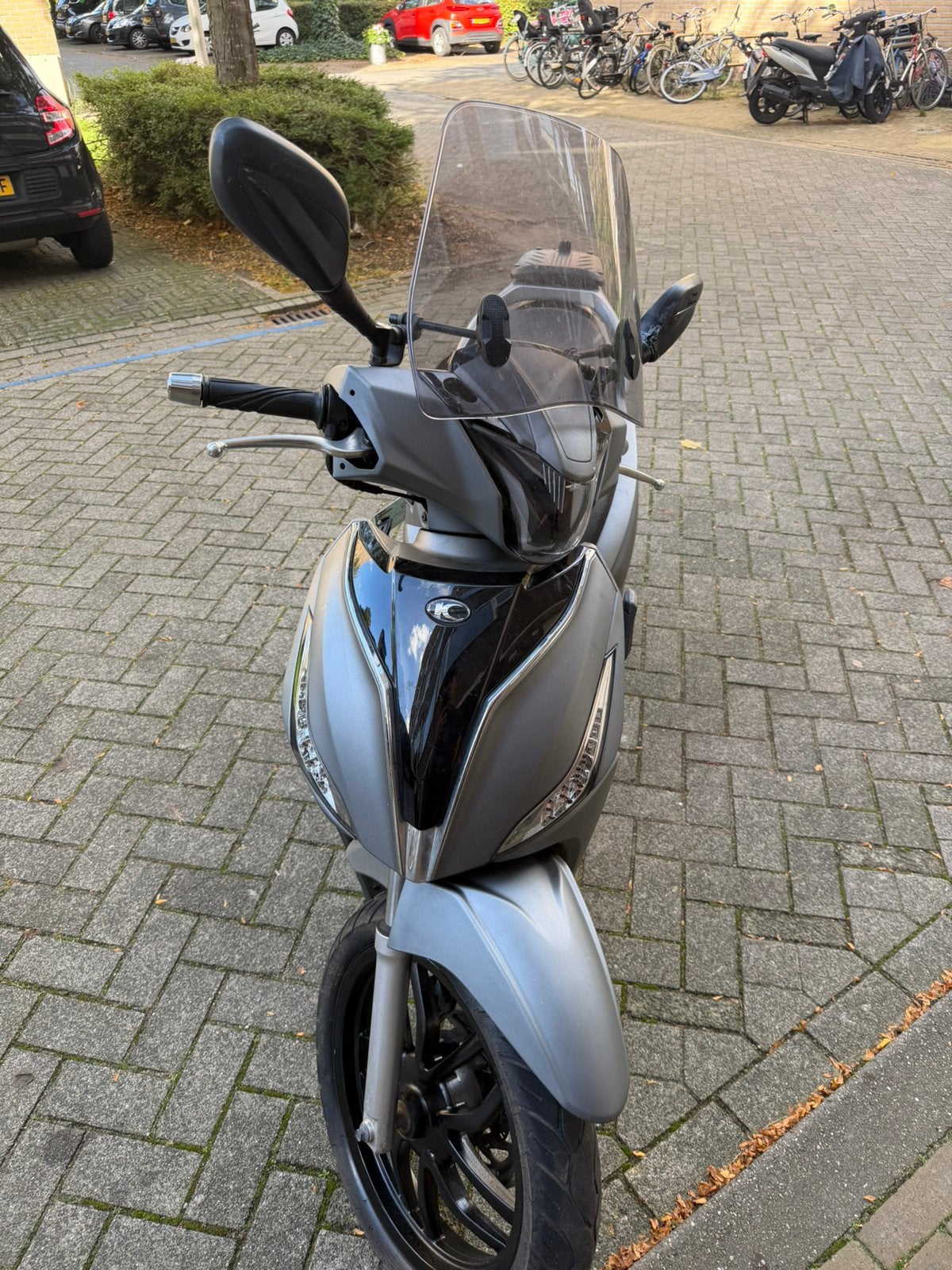 Kymco new people s, Fietsen en Brommers, Ophalen, Maximaal 45 km/u, Zo goed als nieuw, Benzine