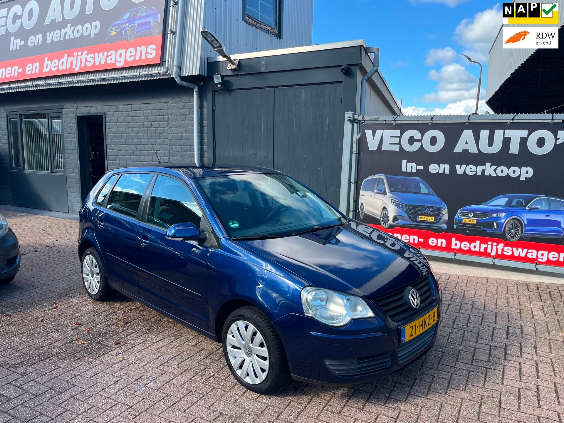 Volkswagen Polo 1.4-16V Comfortline airco 5 deuren, Auto's, Voorwielaandrijving, Dealer onderhouden, Stof, Zwart