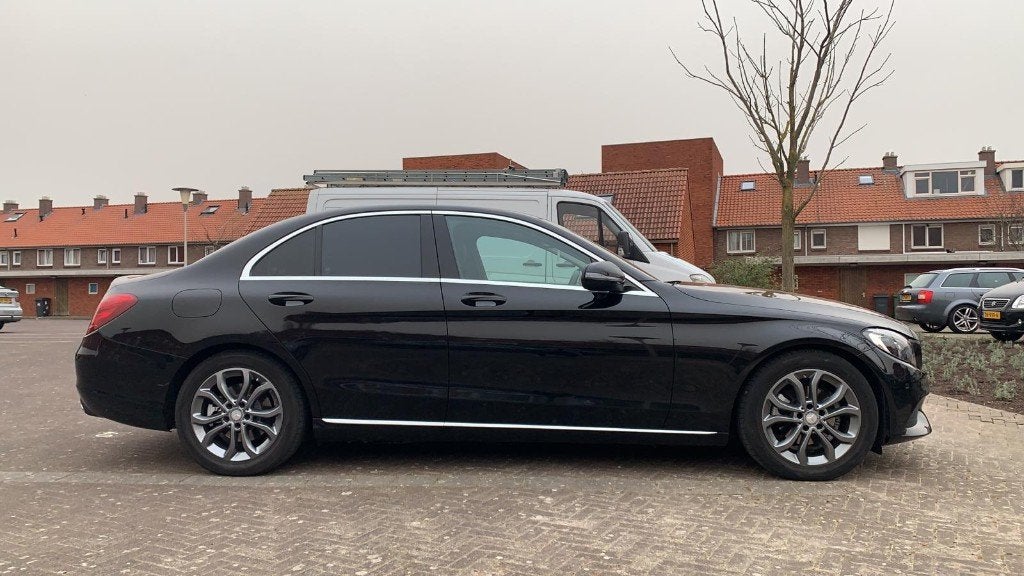 Mercedes-Benz C200 Business Solution  2016 Zwart, Auto's, Automaat, Euro 6, 4 cilinders, Leder en Stof