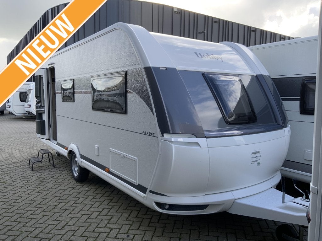 Hobby De Luxe 540 KMFE, Schokbreker, Dwars-stapelbed, Standaardzit, Hobby