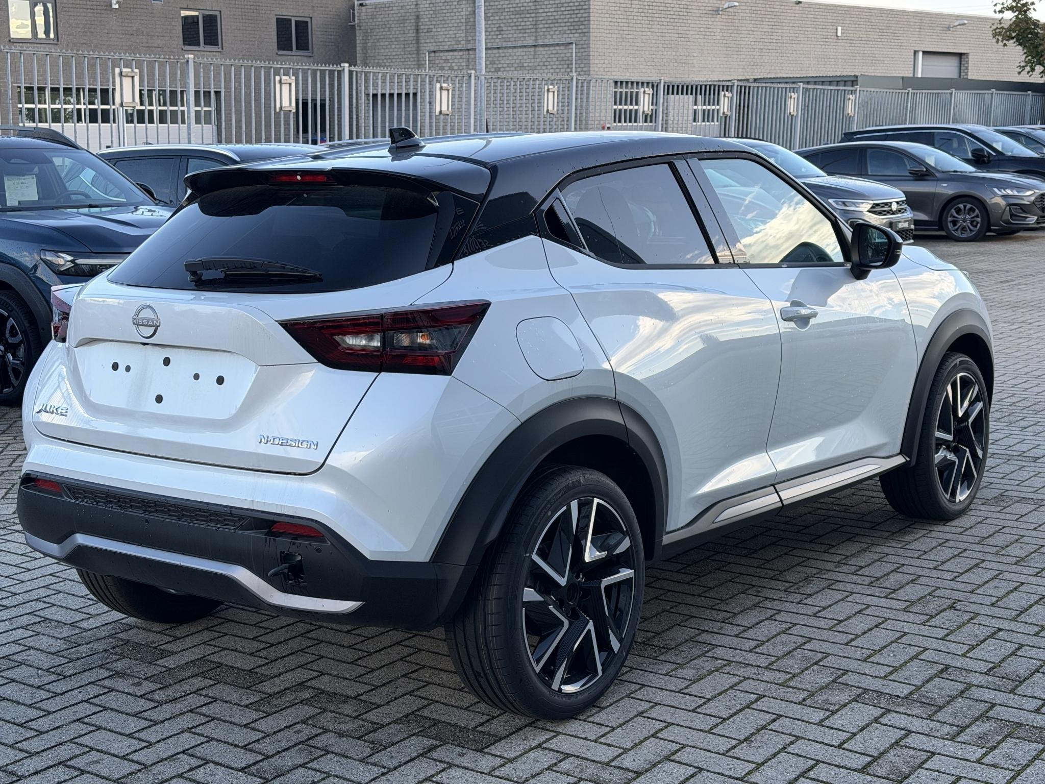 Nissan Juke 1.0 DIG-T 114 N-Design | Cold Pack | Van: € 39, Auto's, Stof, Met garantie (alle), Wit, Bedrijf