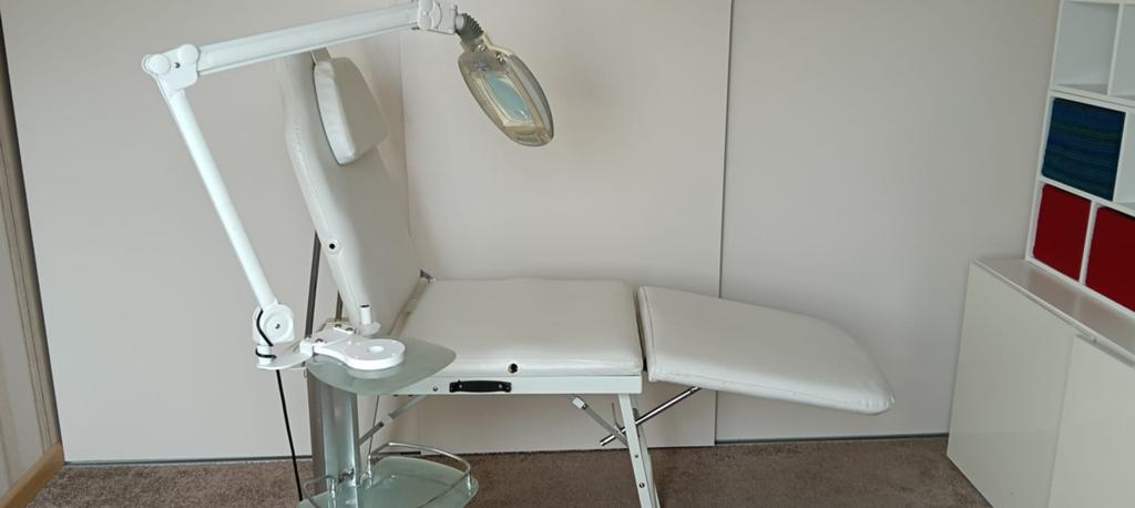 Behandelstoel met tafel en lamp, Ophalen