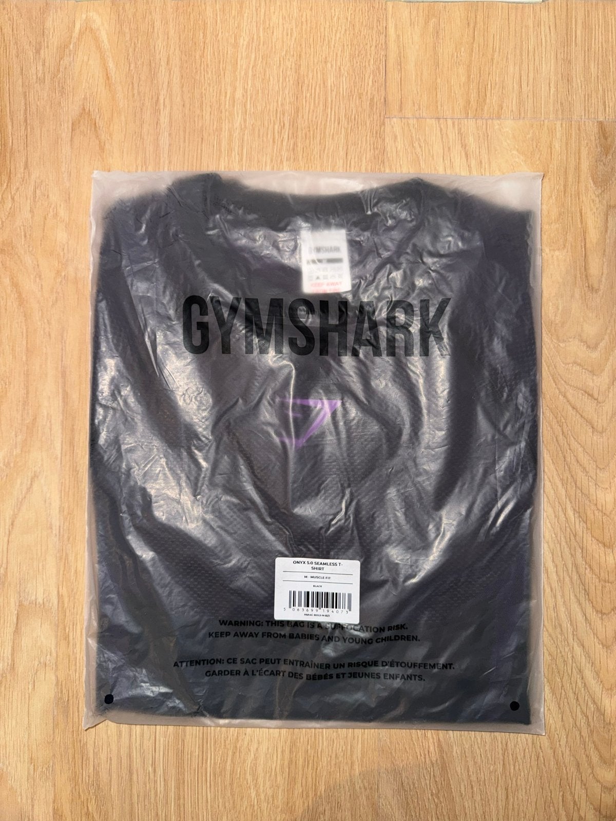 Gymshark Onyx 5.0 Seamless T-Shirt Black Purple Maat M, Ophalen, Fitness, Maat 48/50 (M), Zwart