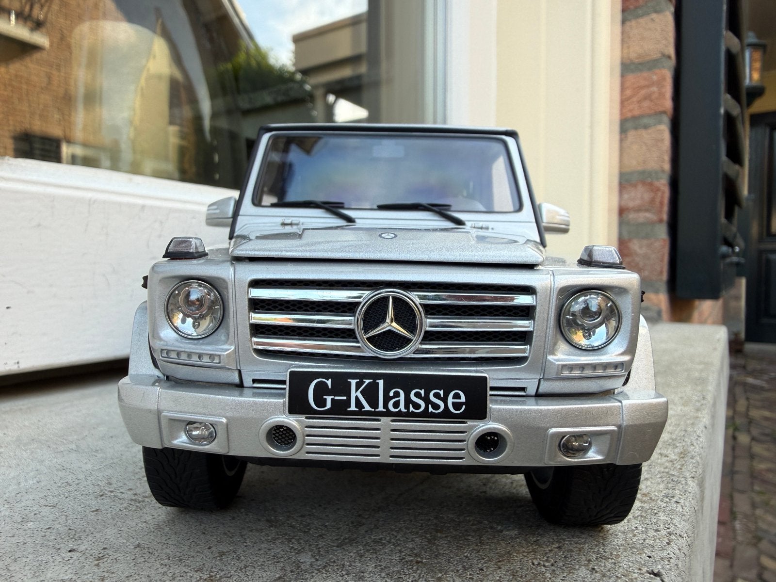1:18 Mercedes G-Klasse G500 zilver 2012 Autoart 76217, Hobby en Vrije tijd, Modelauto's | 1:18, Auto, Autoart, Ophalen of Verzenden