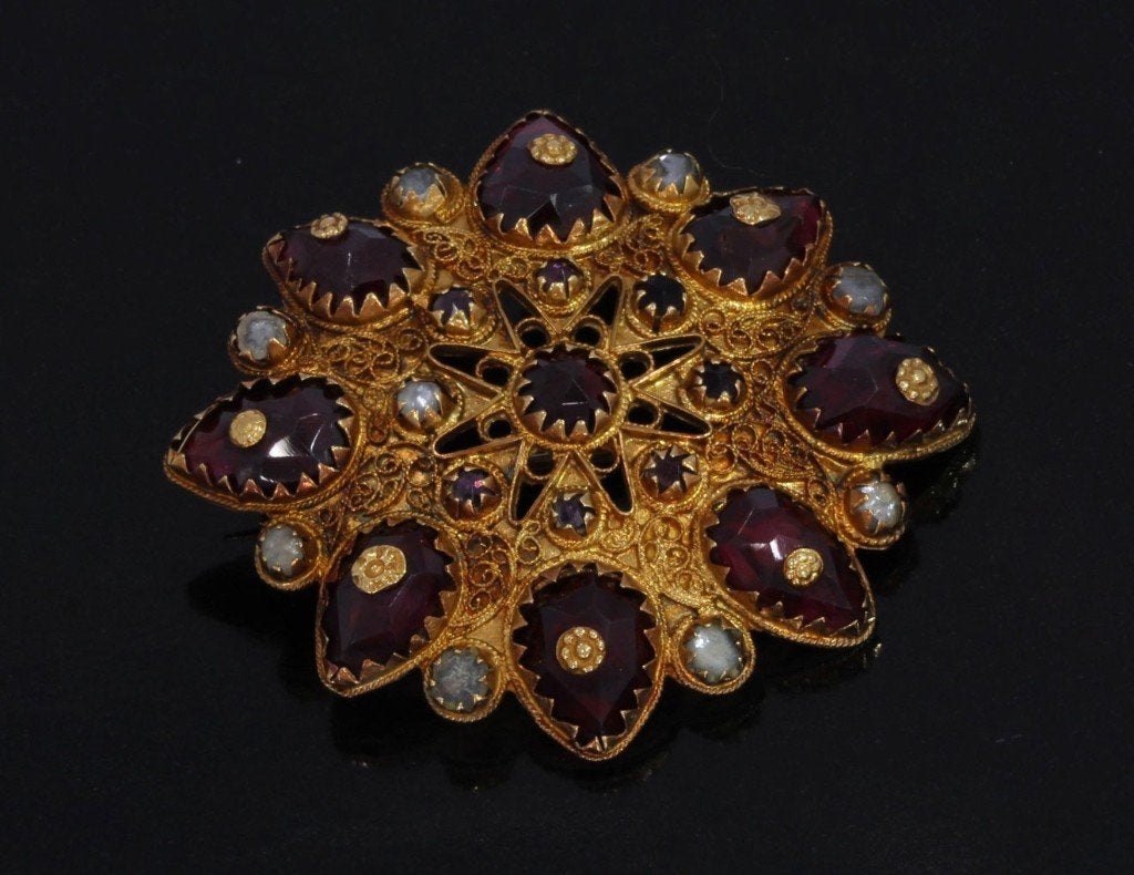 Granaat 14k gouden ster broche antiek Friesland certificaat, Ophalen of Verzenden, Goud, Broche, Met edelsteen