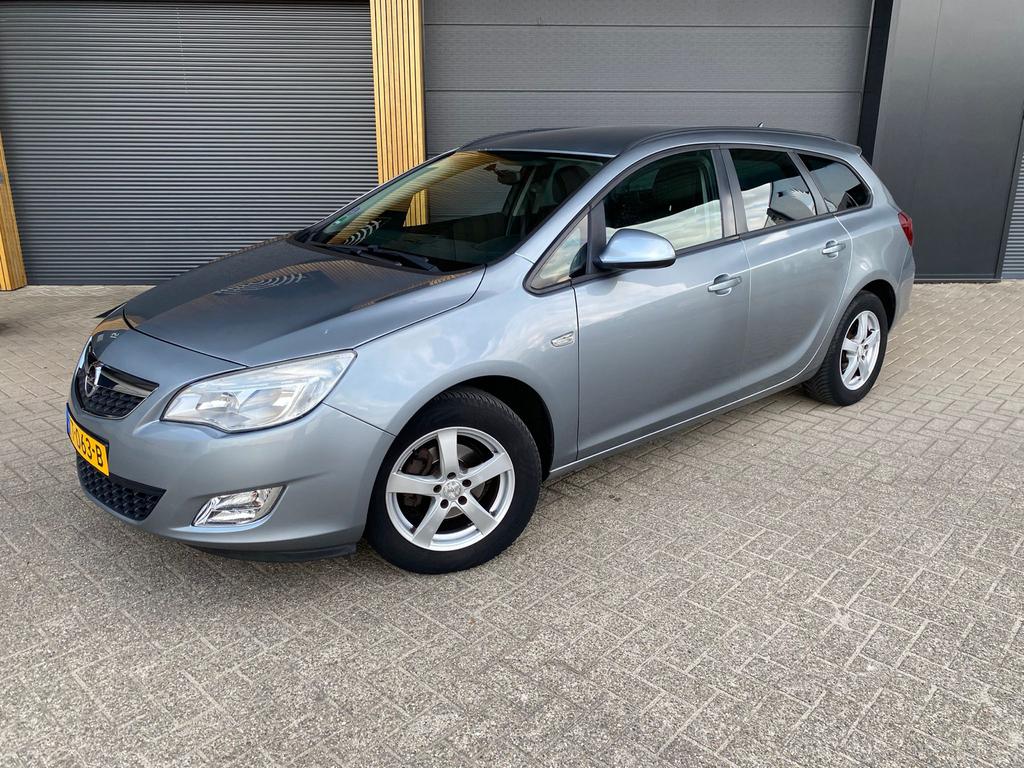 Opel Astra 1.4 Turbo 103KW 5D AUT 2011 Grijs, Auto's, Voorwielaandrijving, Euro 5, Stof, 4 cilinders