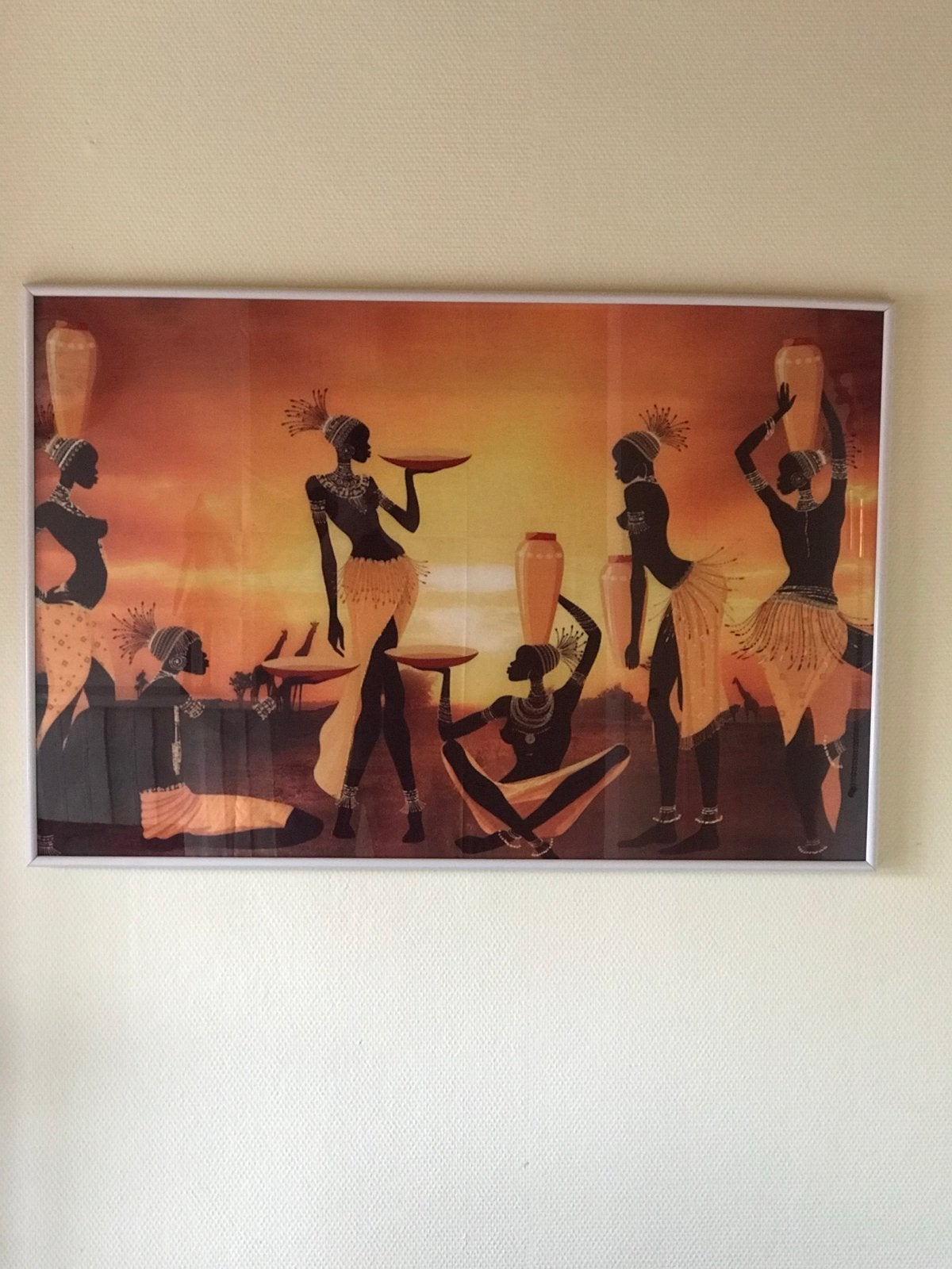 Afrikaanse kunst aan de muur - Vrouwen bij zonsondergang, Ophalen