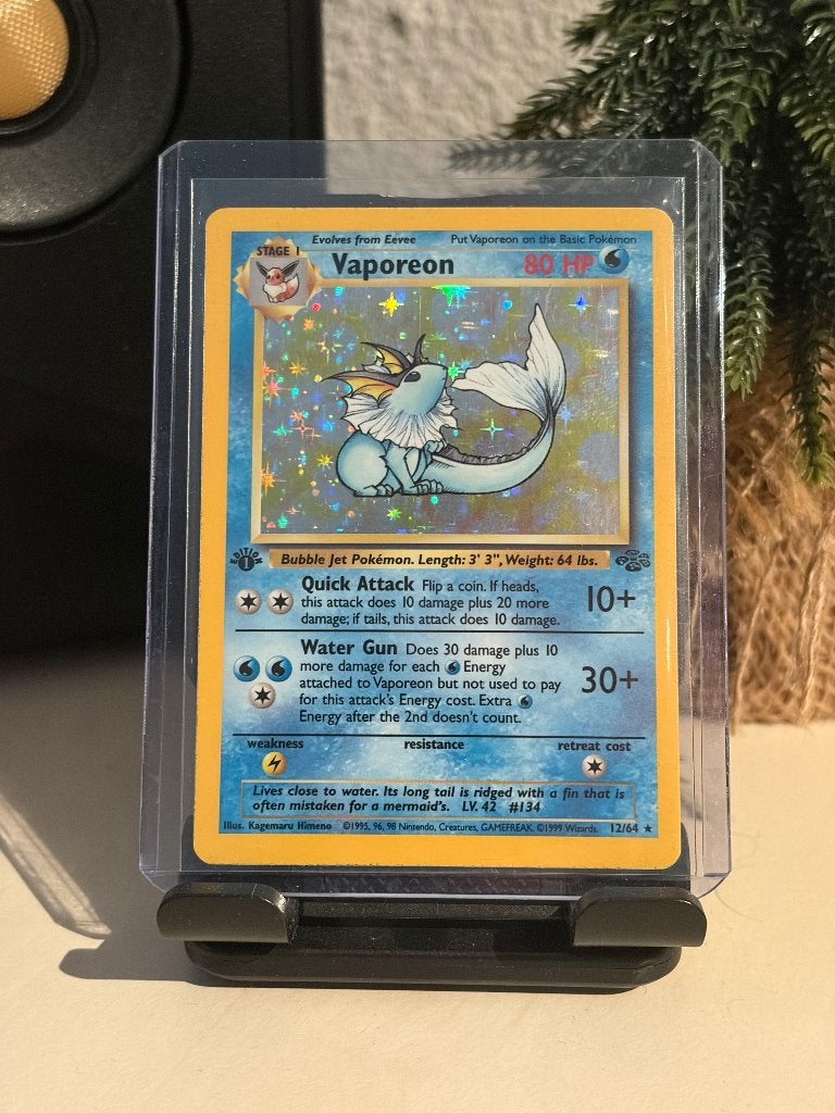 Vaporeon | Holo | 1st Ed | 12/64 | Jungle, Ophalen of Verzenden, Gebruikt, Losse kaart, Foil