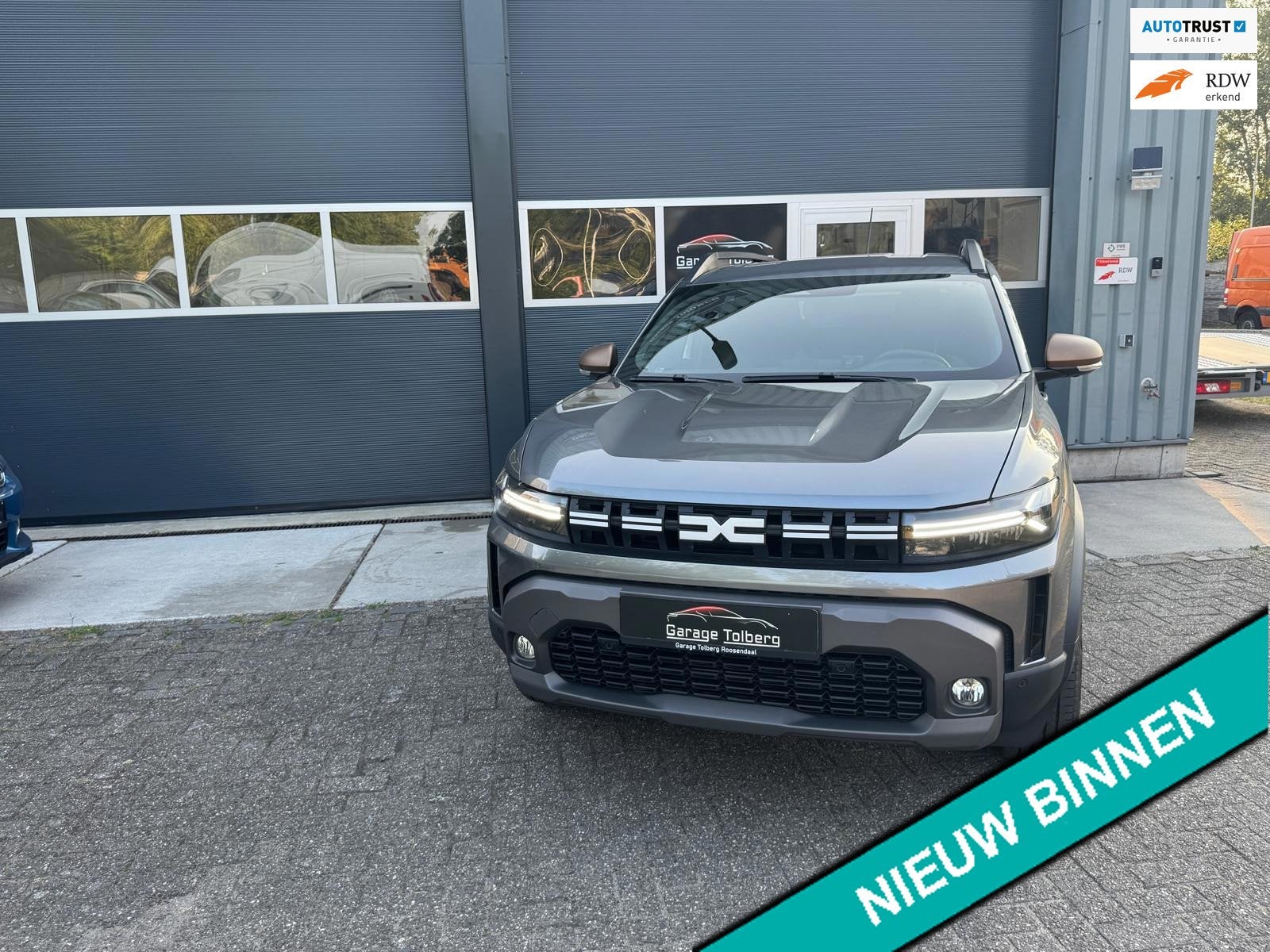 Dacia Duster 1.6 Hybrid 140 Extreme Gris Schiste • 18" lic, Auto's, Dacia, Dealer onderhouden, Stof, 143 pk, Duster