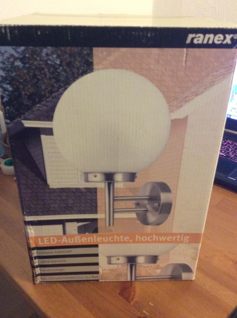 Ranex buitenlamp RVS edelstaal met Glazen bol melkwit., Minder dan 50 watt, Wandlamp, Nieuw, Ophalen of Verzenden