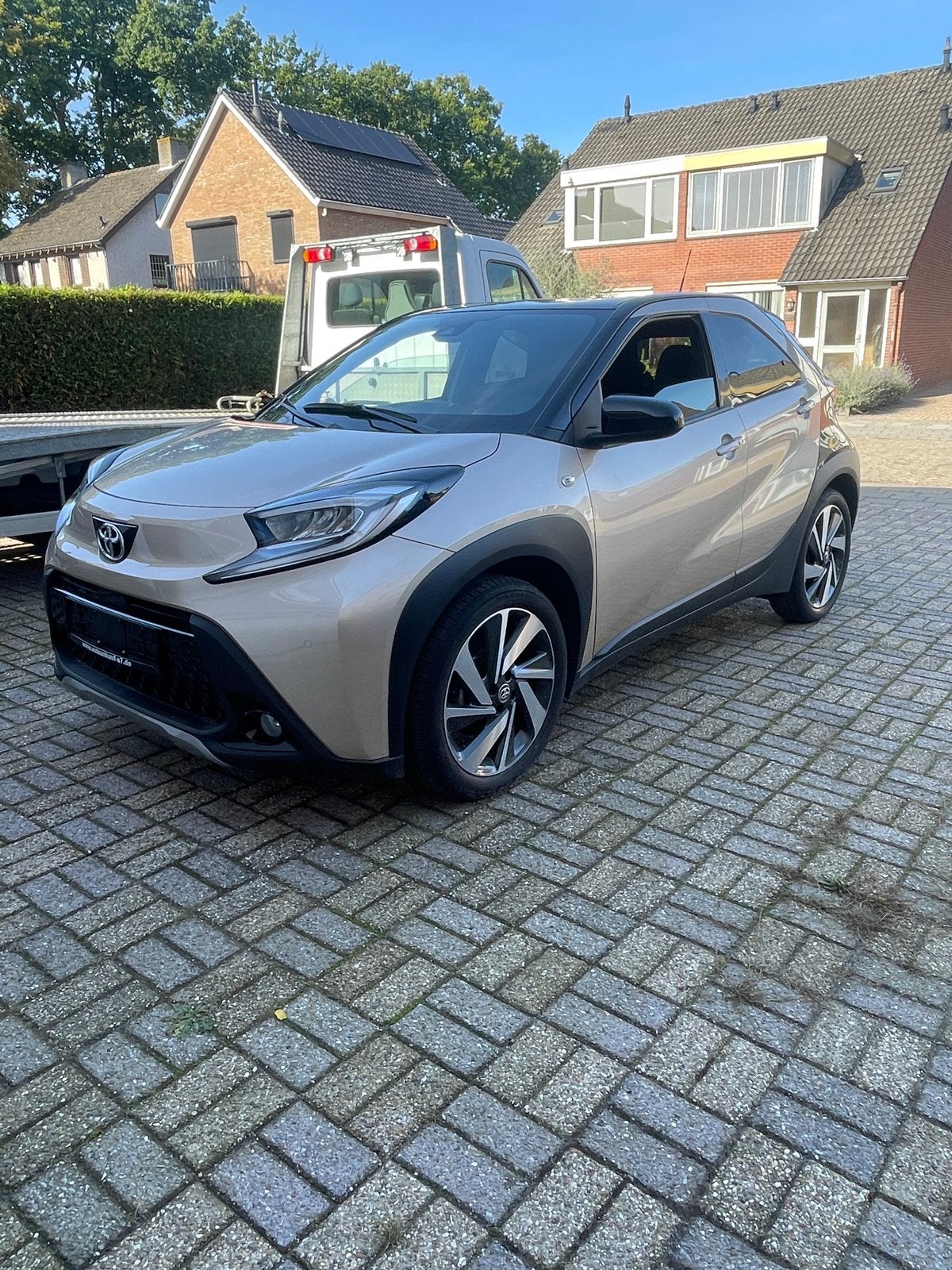 Aygo X JBL Automaat, alle opties, 15045 km, Automaat, Bruin, Ophalen of Verzenden, Toyota