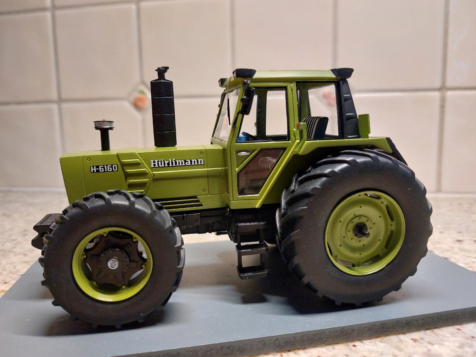 Hürlimann H-6160, Hobby en Vrije tijd, Modelauto's | 1:32, Ophalen of Verzenden, Nieuw, Tractor of Landbouw, Schuco